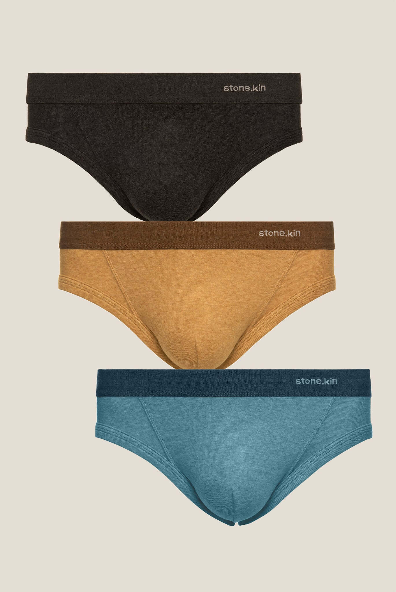 Men's Brief 3 Pack in Organic Cotton featuring Tar, Camel, and Lake colors.