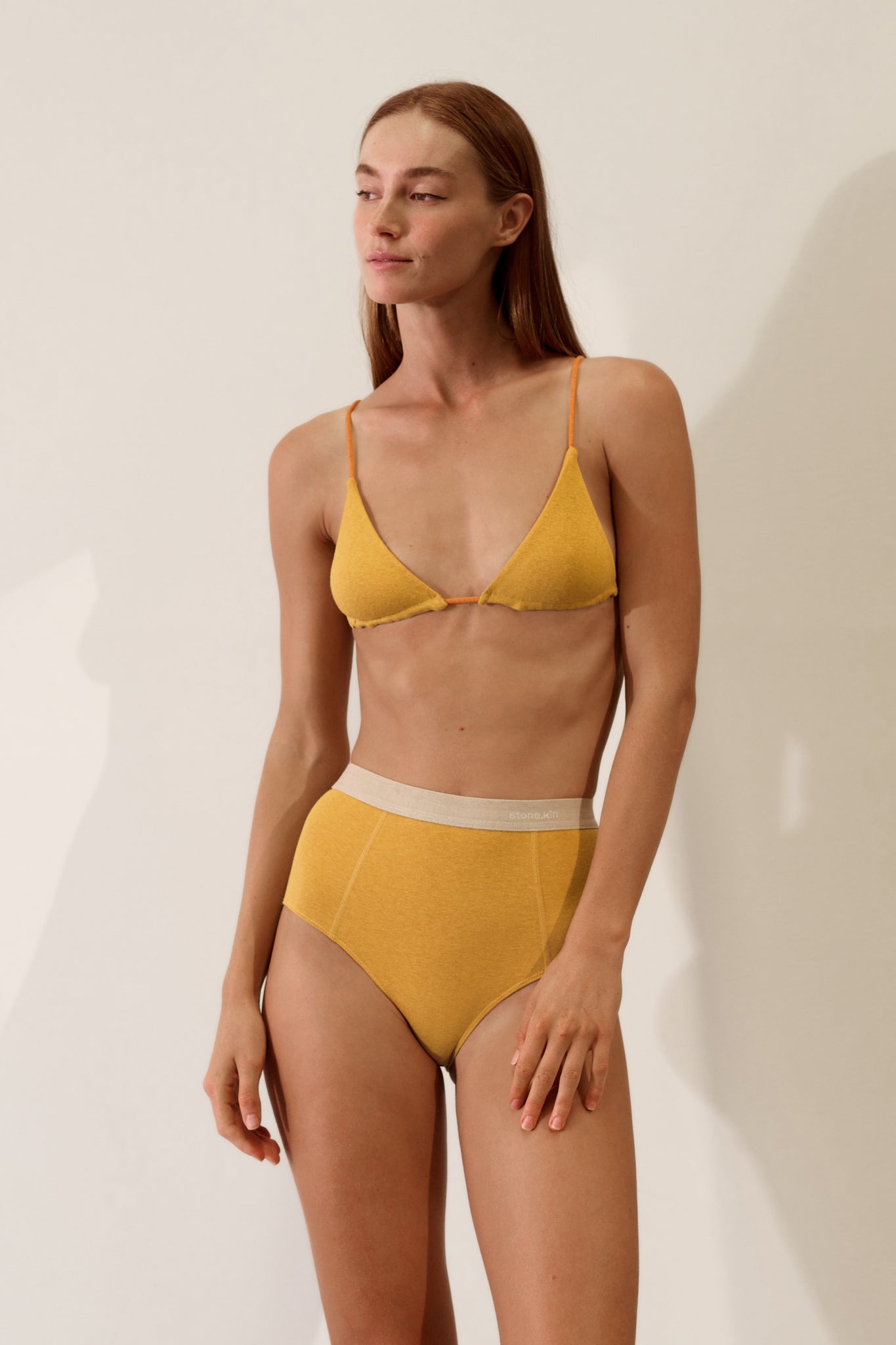 Stone.kin Women's Organic Cotton Rib Brief in Mustard and Sand colours, designed for comfort and breathability. Ethically made from soft, sustainable organic cotton.